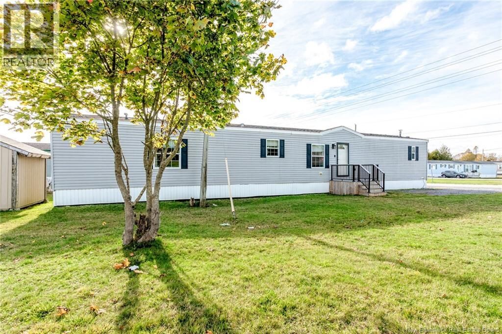 Property Photo:  3 Daisy Street  NB E2M 5M9 