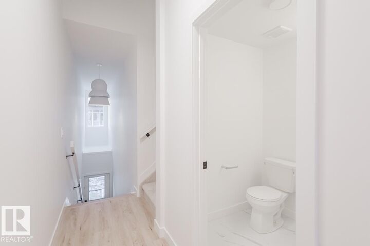 Property Photo: 16231 19 Avenue SW 3 AB T6W 5C6