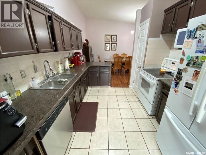 Property Photo:  2 544 Circlebrooke Drive  SK S3N 2T4 