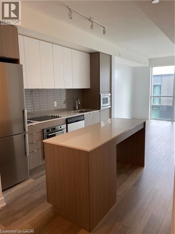 Property Photo: 5220 Dundas Street 412 ON L7R 3X4