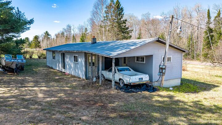 Property Photo:  35698 Tapiola Road  MI 49916 