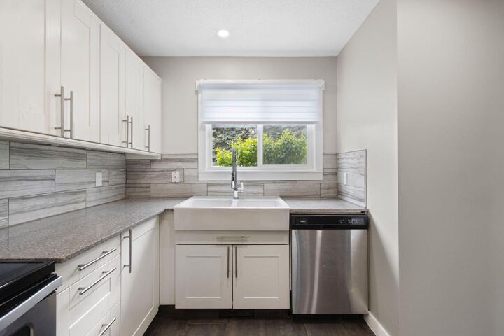 Property Photo:  219 90 Avenue SE 36  AB T2J 0A3 