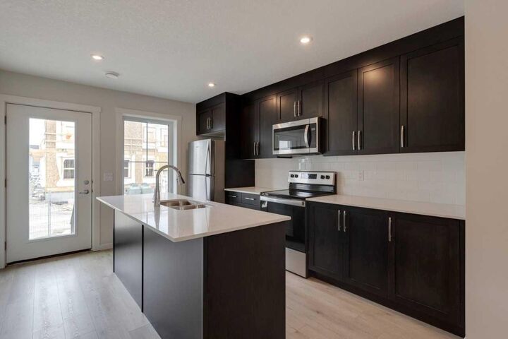 Property Photo:  40 Livingston Parade NE 207  AB T4B 3P6 