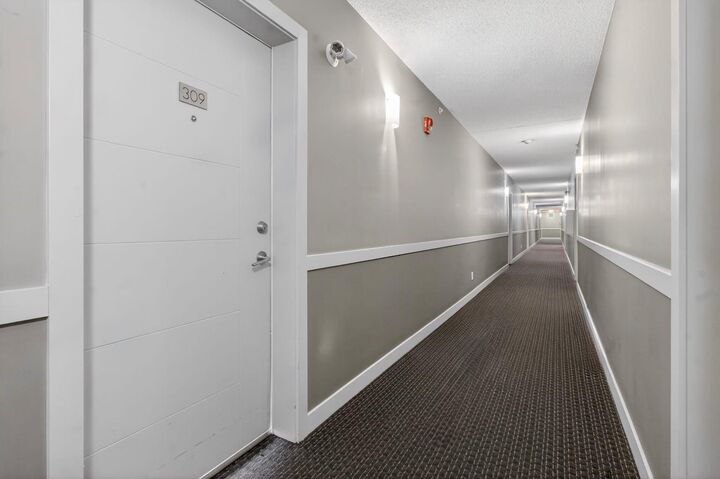 Property Photo: 12 Sage Hill Terrace NW 309 AB T3R 0W6