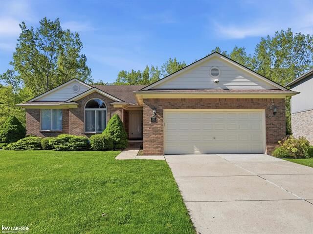 Property Photo:  51927 Copper Creek Court  MI 48047 