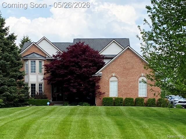 Property Photo:  1802 Mist Wood Drive  MI 48843 