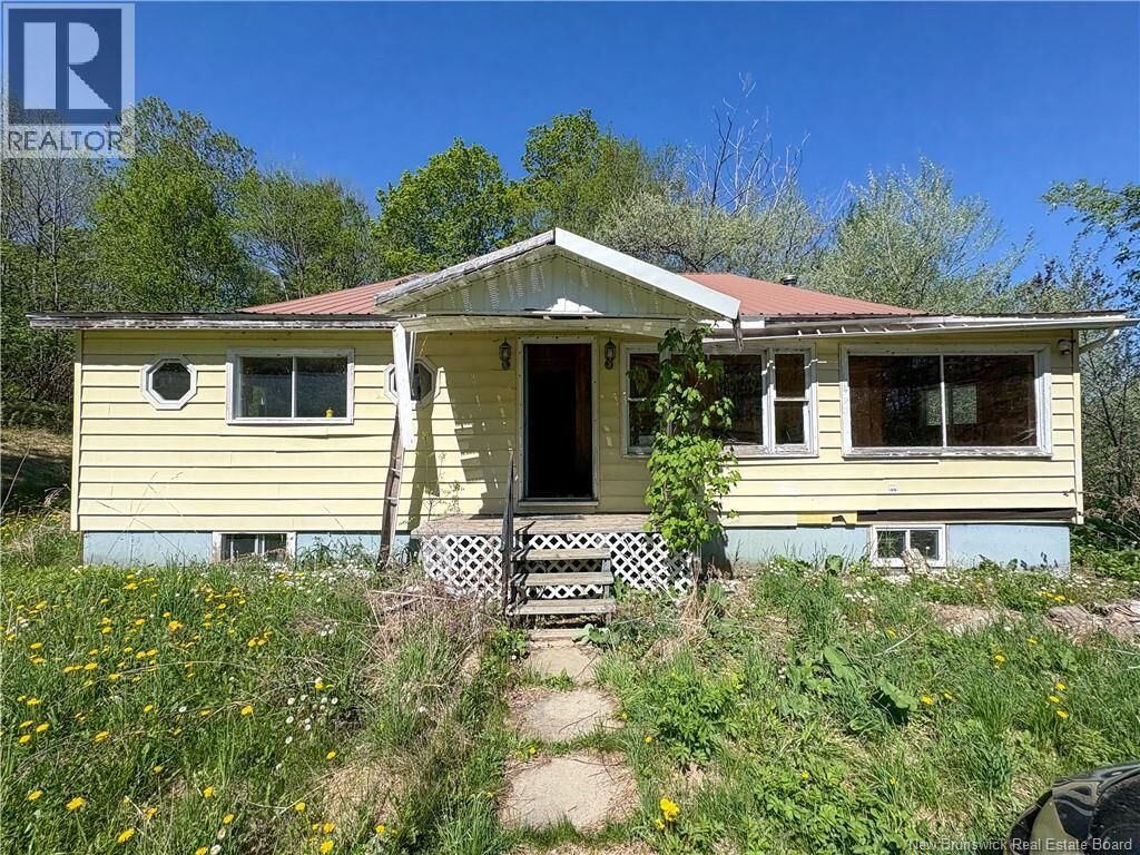 Property Photo:  284 Main Street  NB E6H 1E5 