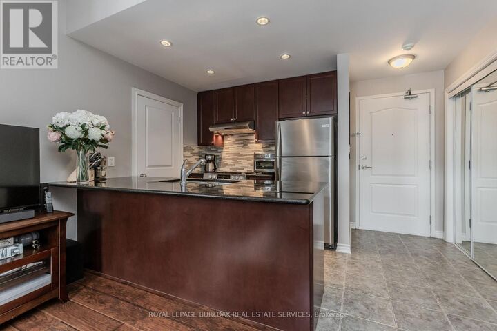 Property Photo: 5327 Upper Middle Road 205 ON L7L 0E9