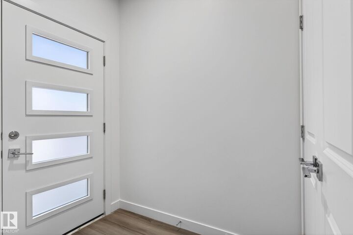 Property Photo: 4853 Alwood Point(E) SW AB T6W 4N1