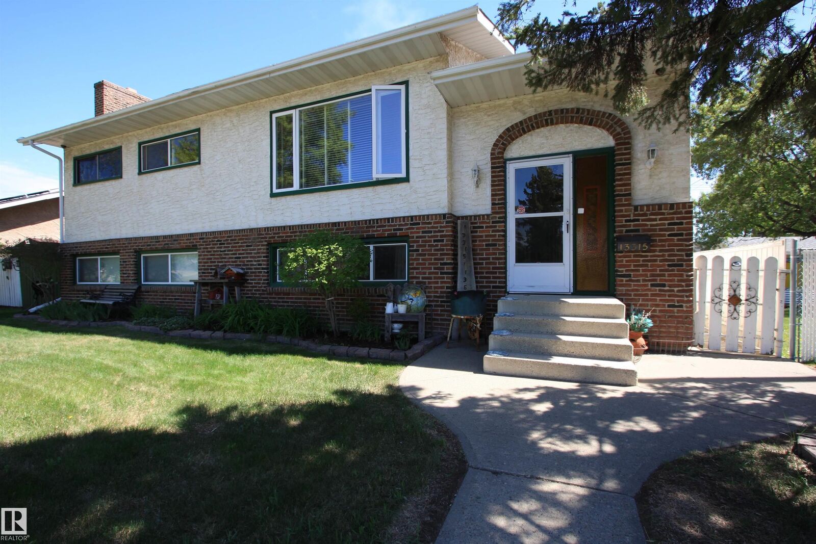 Property Photo:  13315 136 Street NW  AB T5L 1Z8 