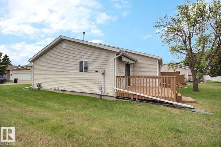 Property Photo:  8146 27 Avenue NW  AB T6K 4C9 