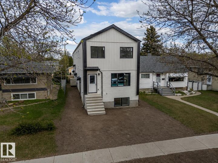 Property Photo: 1, 2, 3 - 12411 81 Street NW AB T5B 2T6