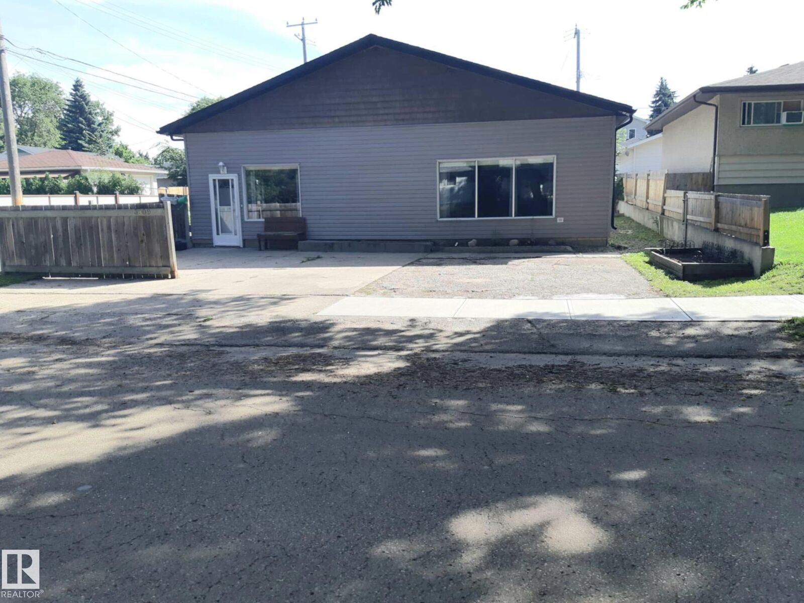Property Photo:  3809 112 Avenue NW  AB T5W 0M5 