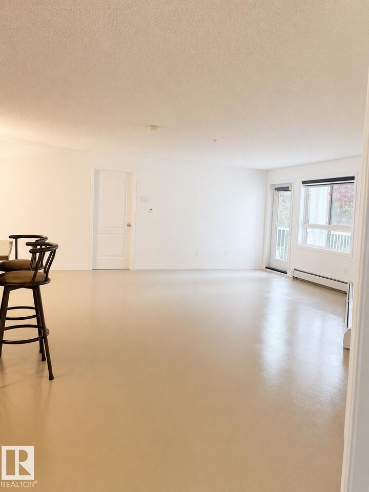 Property Photo: 5340 199 Street NW 115 AB T6M 0A5