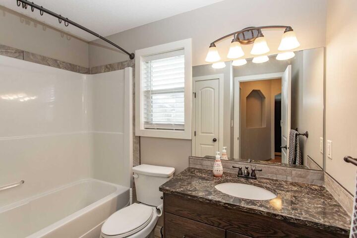 Property Photo: 101 Coachman Way AB T4M 0B4