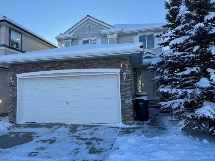 Property Photo: 65 Spring Crescent SW AB T3H 3V2