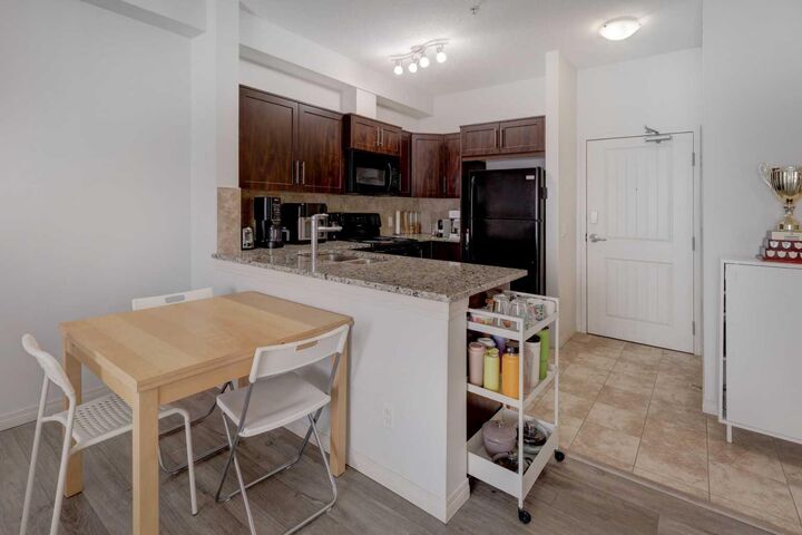 Property Photo: 1540 Sherwood Boulevard NW 1218 AB T3R 0K5