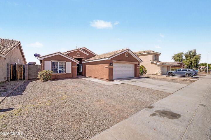 Property Photo:  9961 W Mackenzie Drive  AZ 85037 