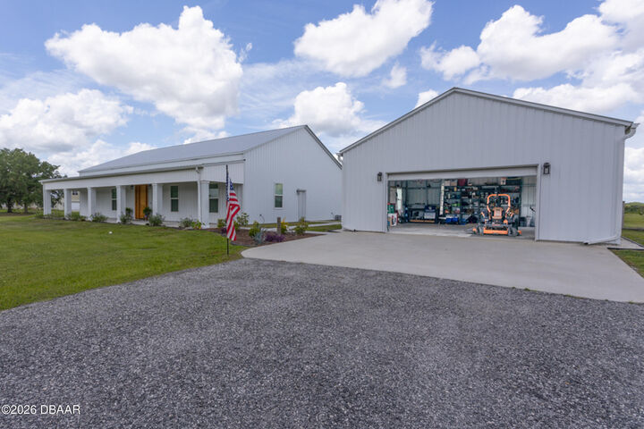 Property Photo:  222 County Road 15  FL 32110 