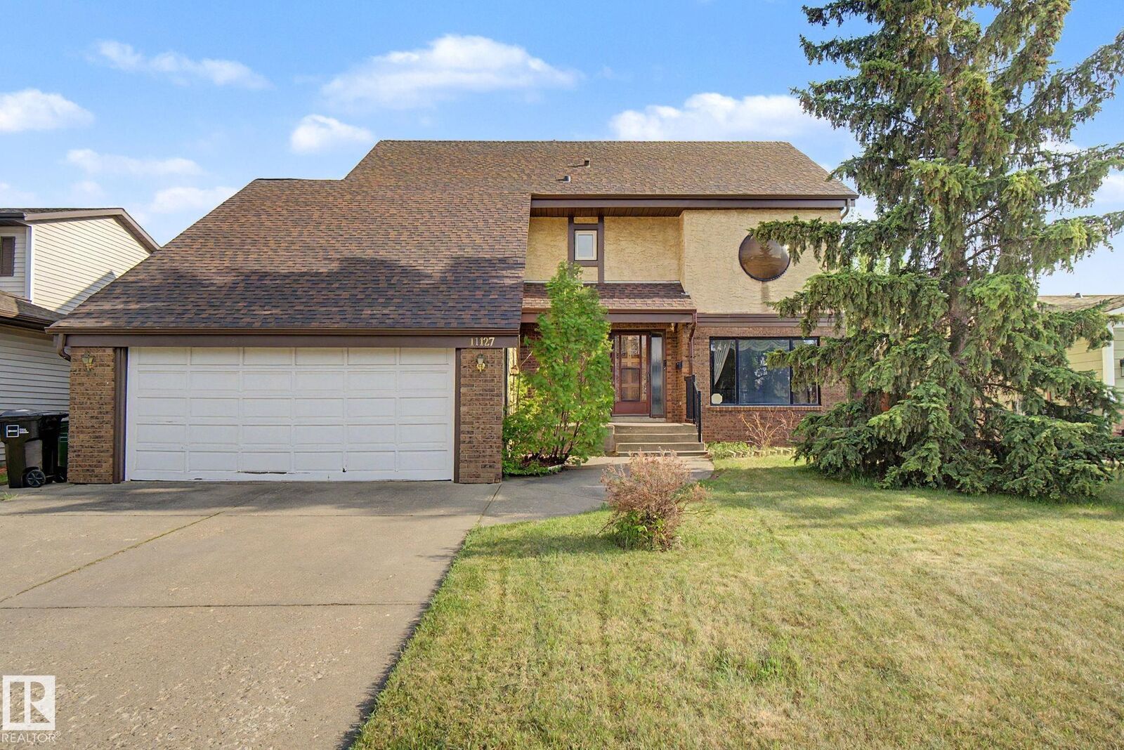 Property Photo: 11127 23A Avenue NW AB T6J 4W5