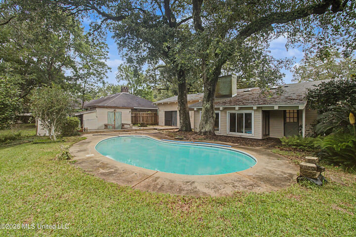 Property Photo:  6621 Golf Club Drive  MS 39525 
