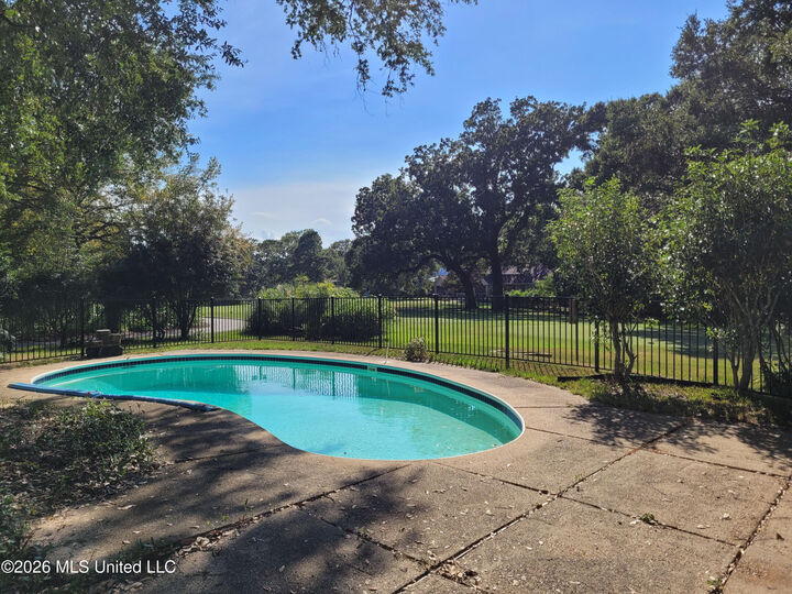 Property Photo:  6621 Golf Club Drive  MS 39525 