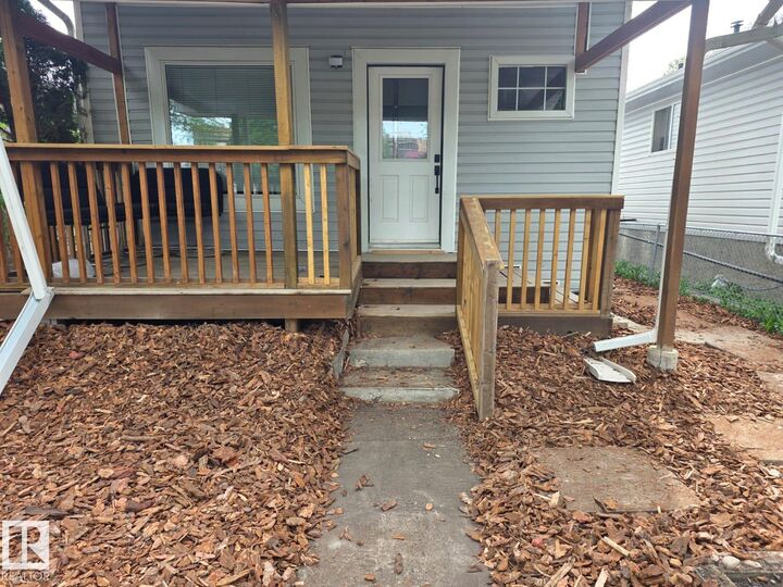 Property Photo: 10656 93 Street NW AB T5H 1X9
