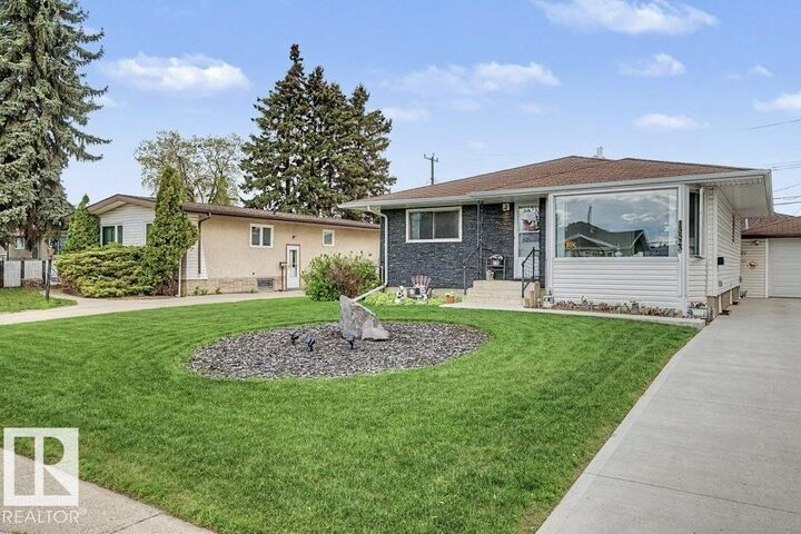 Property Photo: 13523 65 Street NW AB T5A 1A5