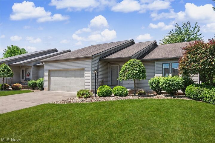 Property Photo: 2345 Whispering Meadows Drive NE B OH 44483