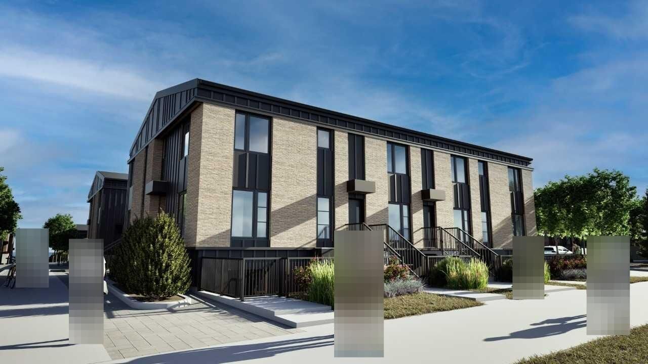 Property Photo: 63 Belmont Passage SE 109 AB T2X 5S8