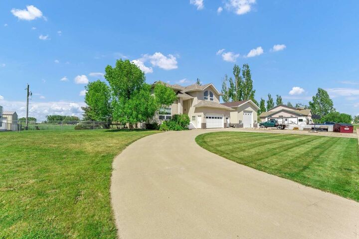 Property Photo: 190014 12 Street W 99 AB T1R 1C7