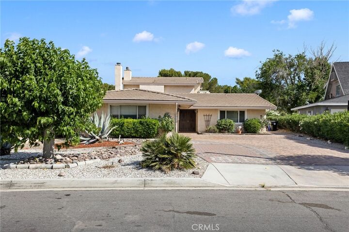 Property Photo:  14991 Blue Grass  CA 92342 