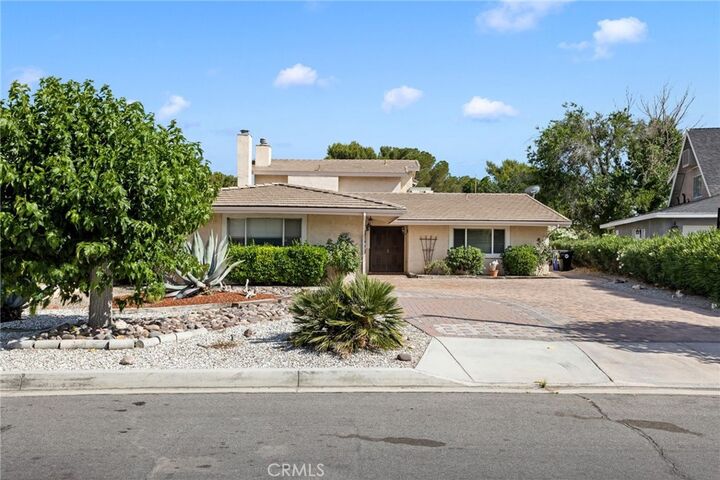 Property Photo:  14991 Blue Grass  CA 92342 
