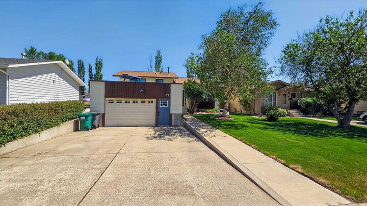 Property Photo:  77 Iroquois Crescent W  AB T1K 5J3 
