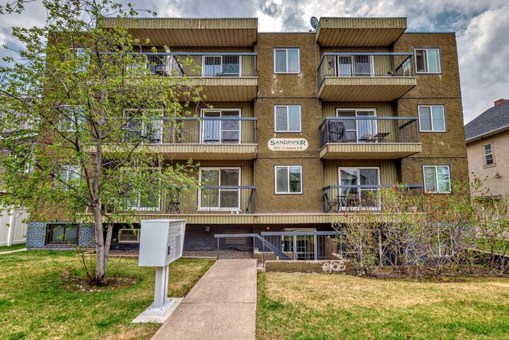 Property Photo: 1613 11 Avenue SW 202 AB T3C 0N3