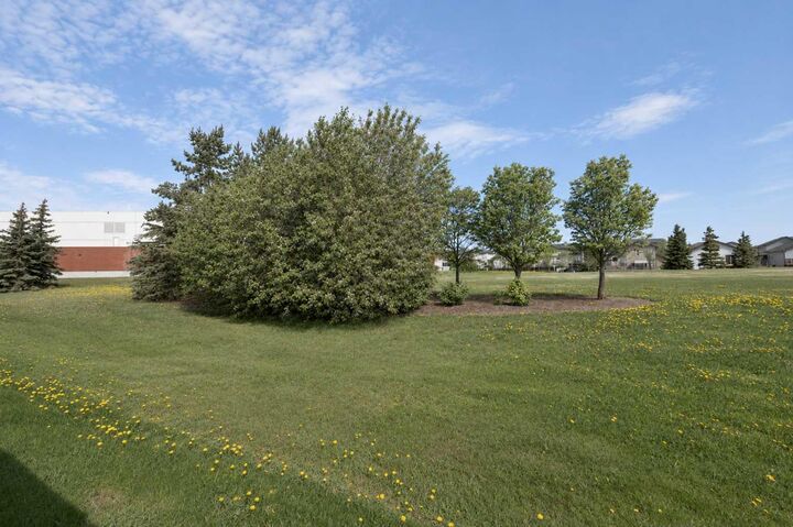 Property Photo:  9102 129 Avenue  AB T8X 1R5 