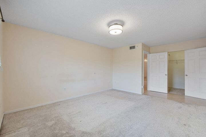 Property Photo:  5011 Wiles Road Unit 303  FL 33073 