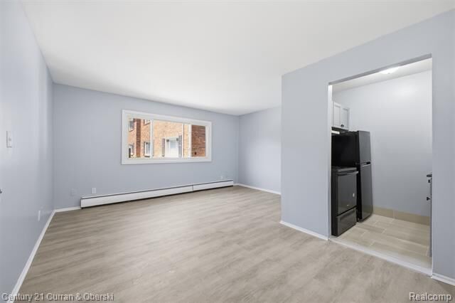 Property Photo:  31831 Grand River Avenue 85  MI 48336 