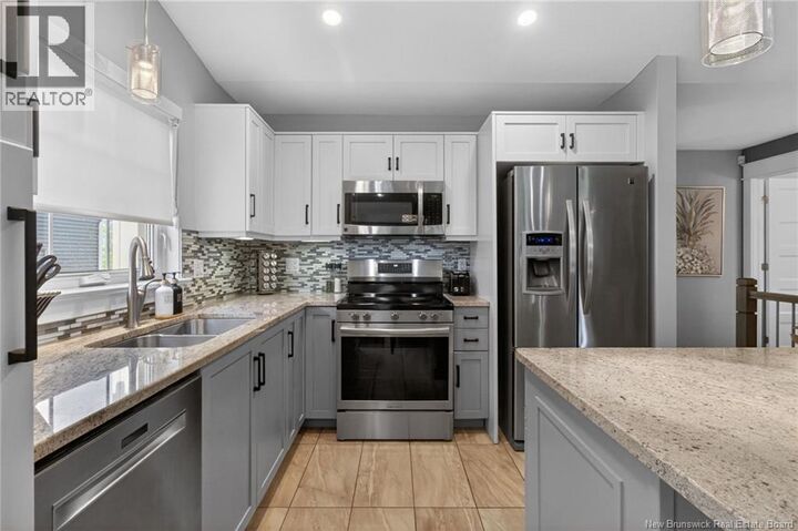 Property Photo: 199 Erinvale Drive NB E1A 9S1