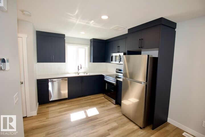 Property Photo:  8043 Cedric Mah Road NW Garage  AB T6W 4M9 