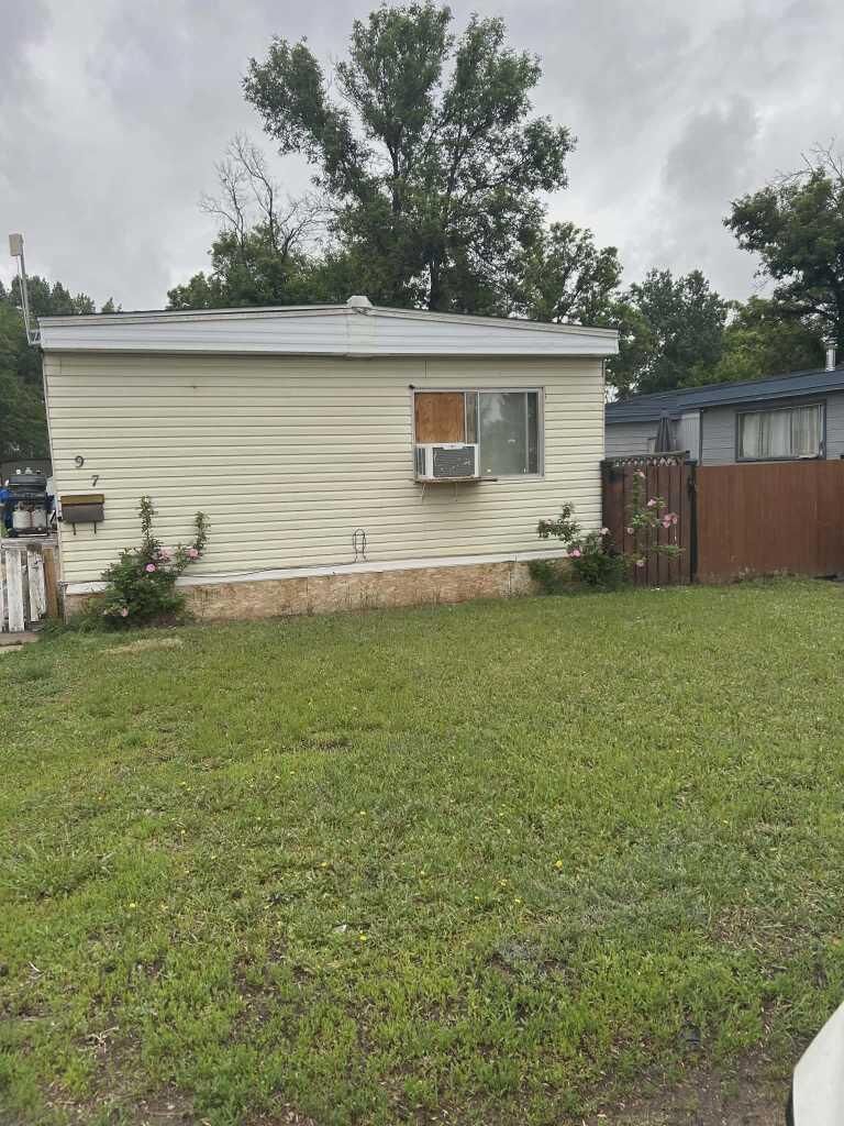 Property Photo:  4000 13 Avenue SE 97  AB T1B 1J3 
