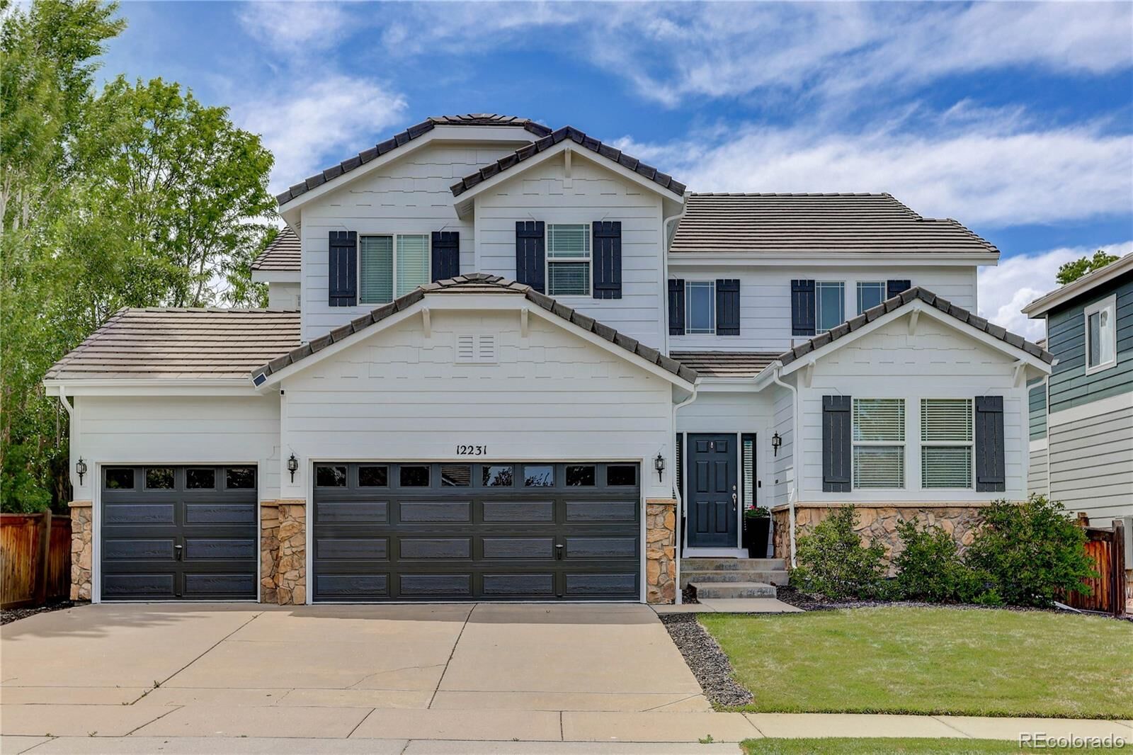 Property Photo:  12231 S Grass River Trail  CO 80134 
