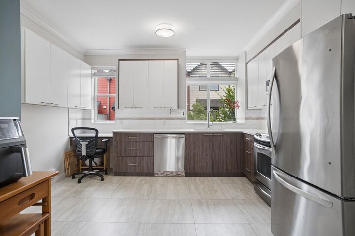 Property Photo: 7533 Gilley Avenue 105 BC V5J 0E8