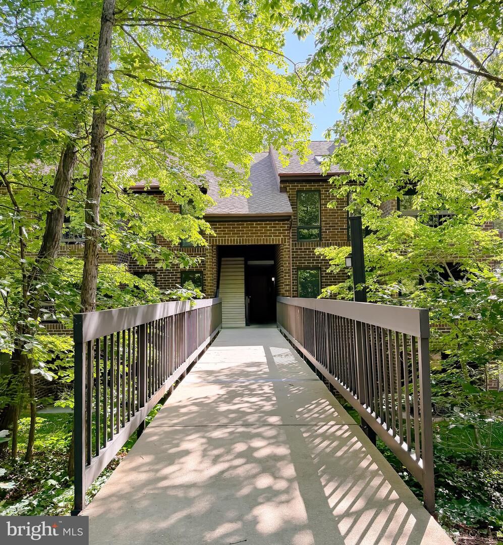 Property Photo:  23250 Chestnut Oak Court 8C  MD 20619 