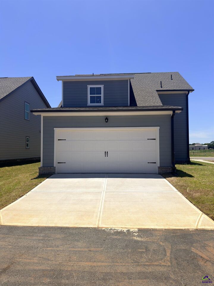 Property Photo:  203 Ensemble Boulevard  GA 31069 