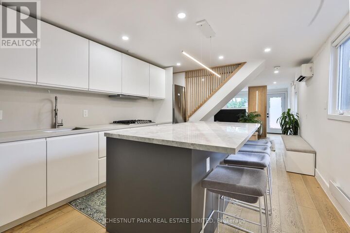 Property Photo:  119 Craven Road  ON M4L 2Z4 