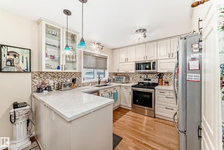 Property Photo:  11650 103 Avenue NW  AB T5K 0S6 