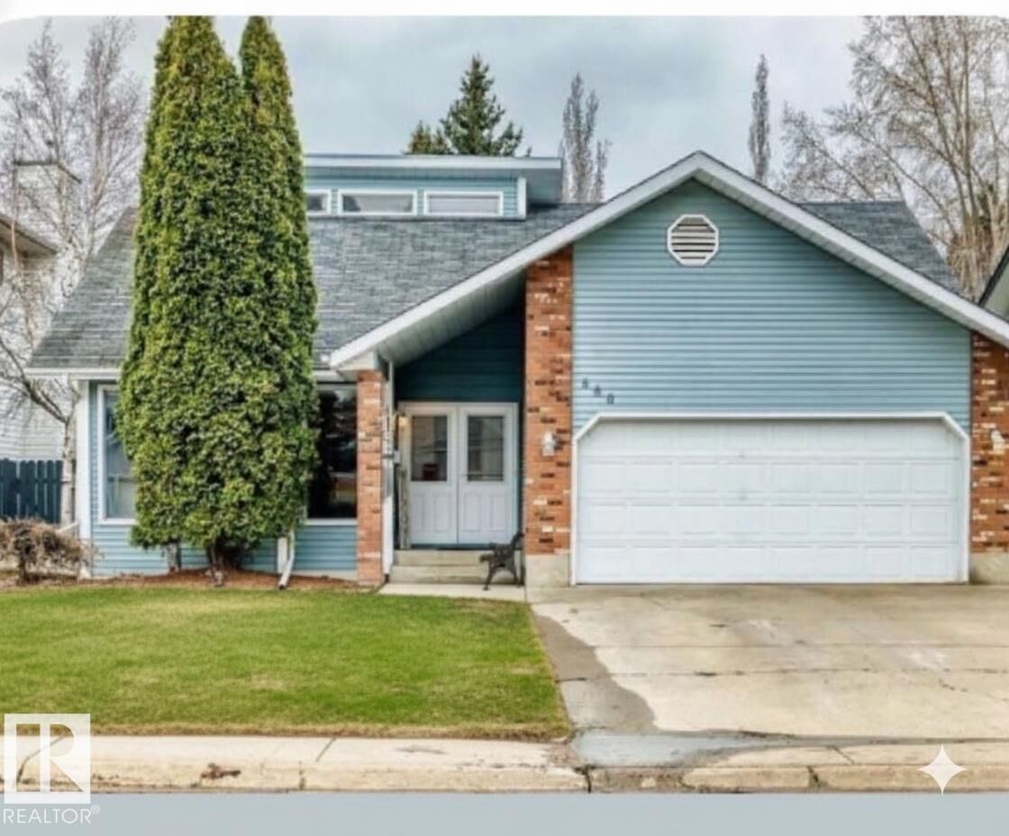 Property Photo:  660 Village Drive  AB T8A 4N9 