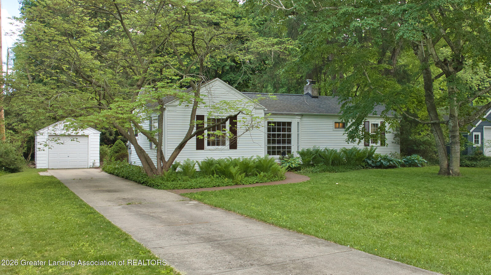 Property Photo:  164 Oakland Drive  MI 48823 