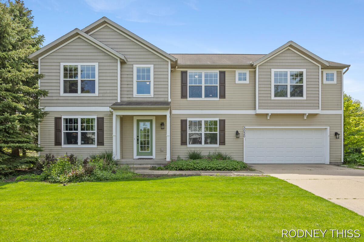 Property Photo:  3030 Sunchase Avenue  MI 49426 
